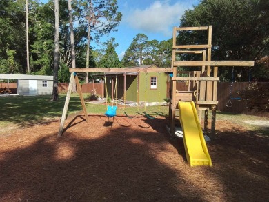 Don't miss this one! Beautifully shaded, freshly painted, well on Wildwood Country Club in Florida - for sale on GolfHomes.com, golf home, golf lot