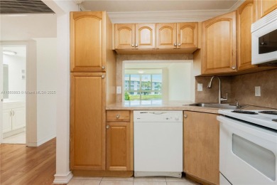 Beautiful apartment with lake front view in the lovely Pine on Pine Island Ridge Country Club in Florida - for sale on GolfHomes.com, golf home, golf lot