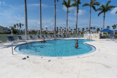 Newly painted two bedroom two full bath one level condo on the on Isla Del Sol Yacht and Country Club in Florida - for sale on GolfHomes.com, golf home, golf lot