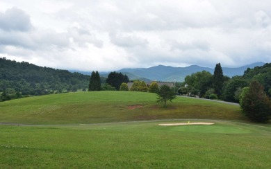Overlooking the 7th green and fairway from this elevated long on Mountain Harbour Golf Club in North Carolina - for sale on GolfHomes.com, golf home, golf lot