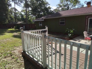 Don't miss this one! Beautifully shaded, freshly painted, well on Wildwood Country Club in Florida - for sale on GolfHomes.com, golf home, golf lot