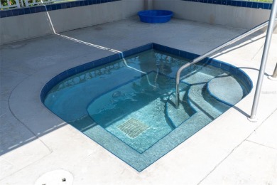 Newly painted two bedroom two full bath one level condo on the on Isla Del Sol Yacht and Country Club in Florida - for sale on GolfHomes.com, golf home, golf lot