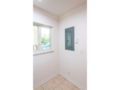 Beautiful apartment with lake front view in the lovely Pine on Pine Island Ridge Country Club in Florida - for sale on GolfHomes.com, golf home, golf lot