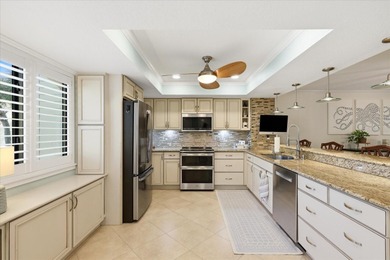 COASTAL RETREAT IN TREASURE ISLAND! Welcome to this on Treasure Bay Golf and Tennis in Florida - for sale on GolfHomes.com, golf home, golf lot