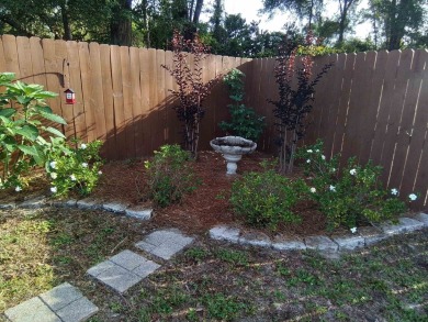 Don't miss this one! Beautifully shaded, freshly painted, well on Wildwood Country Club in Florida - for sale on GolfHomes.com, golf home, golf lot