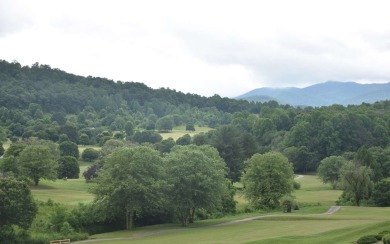 Overlooking the 7th green and fairway from this elevated long on Mountain Harbour Golf Club in North Carolina - for sale on GolfHomes.com, golf home, golf lot