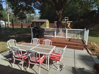 Don't miss this one! Beautifully shaded, freshly painted, well on Wildwood Country Club in Florida - for sale on GolfHomes.com, golf home, golf lot
