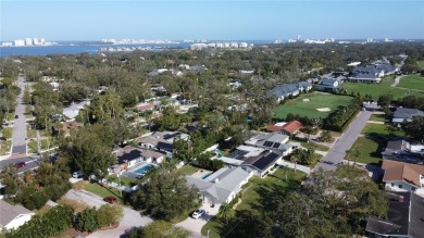 Nestled in the heart of Belleair, this charming 4-bedroom on Belleview Biltmore Golf Club in Florida - for sale on GolfHomes.com, golf home, golf lot