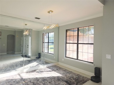 Welcome to this beautiful golf-front brick 3-bedroom, 2-bath on Deltona Golf Club in Florida - for sale on GolfHomes.com, golf home, golf lot