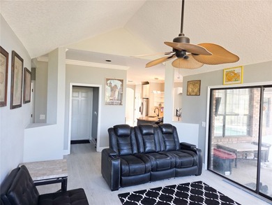 Welcome to this beautiful golf-front brick 3-bedroom, 2-bath on Deltona Golf Club in Florida - for sale on GolfHomes.com, golf home, golf lot