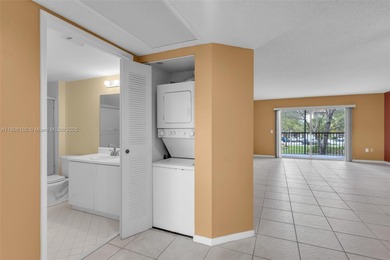 Welcome to this bright and spacious 2-bedroom, 2-bath condo in on Flamingo Lakes Country Club in Florida - for sale on GolfHomes.com, golf home, golf lot