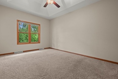 Enjoy gorgeous views in this impressive condo on the 13th hole on Meadowbrook Country Club in Wisconsin - for sale on GolfHomes.com, golf home, golf lot