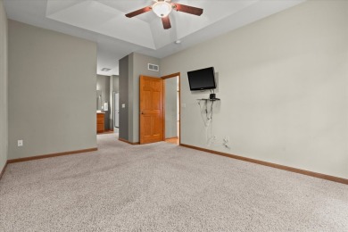Enjoy gorgeous views in this impressive condo on the 13th hole on Meadowbrook Country Club in Wisconsin - for sale on GolfHomes.com, golf home, golf lot