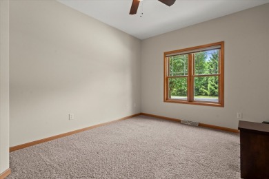Enjoy gorgeous views in this impressive condo on the 13th hole on Meadowbrook Country Club in Wisconsin - for sale on GolfHomes.com, golf home, golf lot
