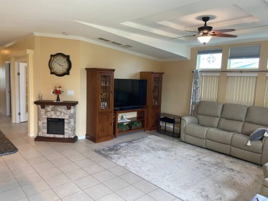 I don't where to start, but here we go!  This Palm Harbor, FULL on Southport Springs Golf Club in Florida - for sale on GolfHomes.com, golf home, golf lot
