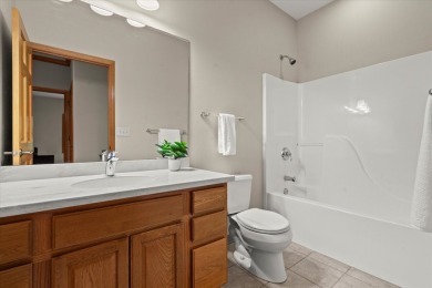 Enjoy gorgeous views in this impressive condo on the 13th hole on Meadowbrook Country Club in Wisconsin - for sale on GolfHomes.com, golf home, golf lot