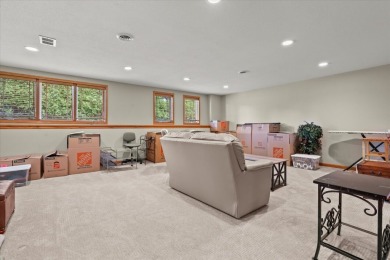 Enjoy gorgeous views in this impressive condo on the 13th hole on Meadowbrook Country Club in Wisconsin - for sale on GolfHomes.com, golf home, golf lot