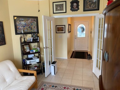 I don't where to start, but here we go!  This Palm Harbor, FULL on Southport Springs Golf Club in Florida - for sale on GolfHomes.com, golf home, golf lot