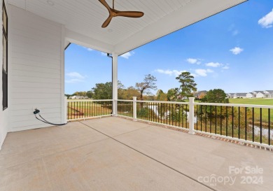 This exquisite new construction home, set on over half an acre on Deer Brook Golf Club in North Carolina - for sale on GolfHomes.com, golf home, golf lot