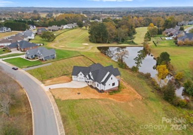 This exquisite new construction home, set on over half an acre on Deer Brook Golf Club in North Carolina - for sale on GolfHomes.com, golf home, golf lot