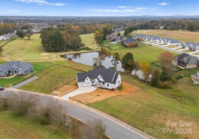 This exquisite new construction home, set on over half an acre on Deer Brook Golf Club in North Carolina - for sale on GolfHomes.com, golf home, golf lot