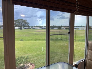 I don't where to start, but here we go!  This Palm Harbor, FULL on Southport Springs Golf Club in Florida - for sale on GolfHomes.com, golf home, golf lot