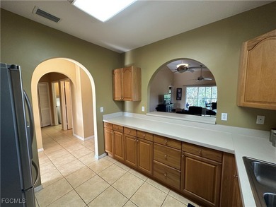 This 2nd-floor end-unit condo is shaded by mature trees and on Westminster Golf Club in Florida - for sale on GolfHomes.com, golf home, golf lot