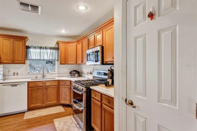 ALOT OF HOME FOR THE MONEY! $79,000 in updates  ALL BONDS ARE on Arlington Ridge Golf Club in Florida - for sale on GolfHomes.com, golf home, golf lot