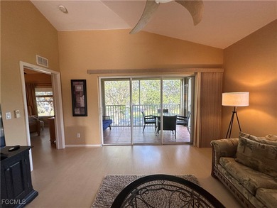 This 2nd-floor end-unit condo is shaded by mature trees and on Westminster Golf Club in Florida - for sale on GolfHomes.com, golf home, golf lot