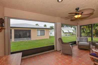 Very solid concrete block home with metal roof and accordion on Spanish Lakes I in Florida - for sale on GolfHomes.com, golf home, golf lot