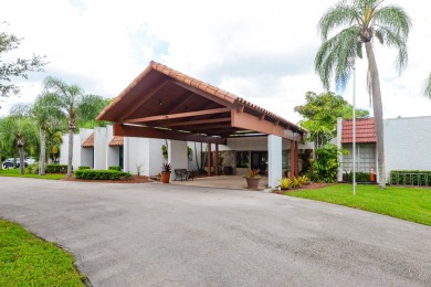 Very solid concrete block home with metal roof and accordion on Spanish Lakes I in Florida - for sale on GolfHomes.com, golf home, golf lot