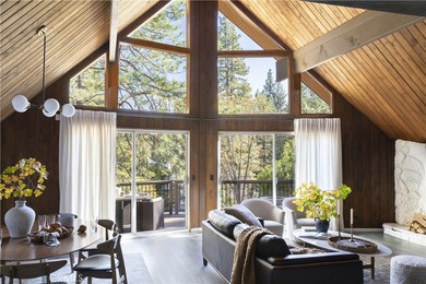 Set across from the golf course, this updated prow-front cabin on Lake Arrowhead Country Club in California - for sale on GolfHomes.com, golf home, golf lot