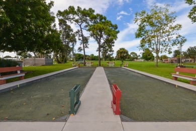 Very solid concrete block home with metal roof and accordion on Spanish Lakes I in Florida - for sale on GolfHomes.com, golf home, golf lot