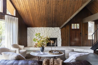 Set across from the golf course, this updated prow-front cabin on Lake Arrowhead Country Club in California - for sale on GolfHomes.com, golf home, golf lot