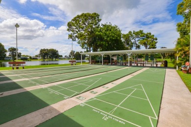 Very solid concrete block home with metal roof and accordion on Spanish Lakes I in Florida - for sale on GolfHomes.com, golf home, golf lot