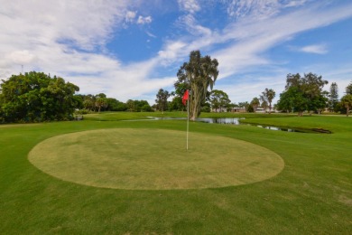 Very solid concrete block home with metal roof and accordion on Spanish Lakes I in Florida - for sale on GolfHomes.com, golf home, golf lot