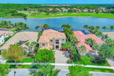 MAGNIFICENT AND RARE TRIFECTA VIEW OF GOLF, LAKE AND PRESERVE ON on Jupiter Country Club in Florida - for sale on GolfHomes.com, golf home, golf lot