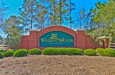 Wooded lot overlooking the 4th Fairway of the Heron course on Carolina National Golf Club in North Carolina - for sale on GolfHomes.com, golf home, golf lot