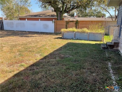 Charming 3 bedroom, 1.5 bath home located by the golf course and on Cuero Park Municipal Golf Course in Texas - for sale on GolfHomes.com, golf home, golf lot