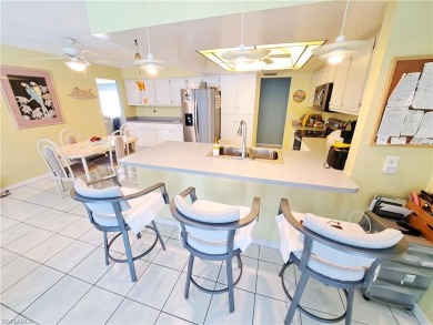 This spacious 2,133 square foot pool home sits on a corner lot on El Rio Golf Course and Club in Florida - for sale on GolfHomes.com, golf home, golf lot