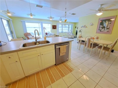 This spacious 2,133 square foot pool home sits on a corner lot on El Rio Golf Course and Club in Florida - for sale on GolfHomes.com, golf home, golf lot
