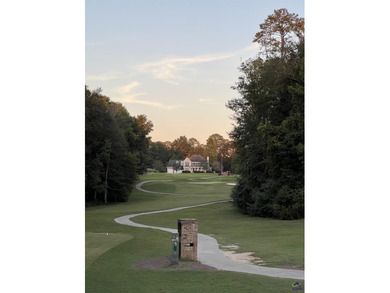 Welcome to this beautifully maintained 4-bedroom, 2.5-bath home on Landings Golf Club in Georgia - for sale on GolfHomes.com, golf home, golf lot