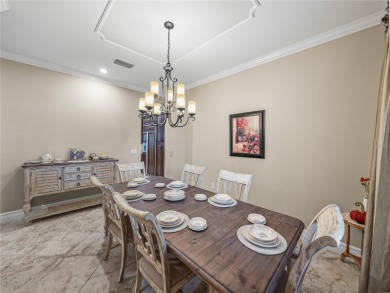 Discover your personal oasis in this stunning 4-bedroom on River Wilderness Golf and Country Club in Florida - for sale on GolfHomes.com, golf home, golf lot