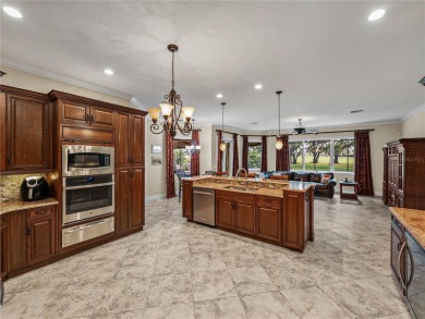 Discover your personal oasis in this stunning 4-bedroom on River Wilderness Golf and Country Club in Florida - for sale on GolfHomes.com, golf home, golf lot