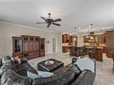 Discover your personal oasis in this stunning 4-bedroom on River Wilderness Golf and Country Club in Florida - for sale on GolfHomes.com, golf home, golf lot