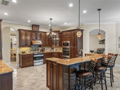 Discover your personal oasis in this stunning 4-bedroom on River Wilderness Golf and Country Club in Florida - for sale on GolfHomes.com, golf home, golf lot