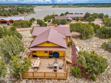 Don't miss this rare opportunity to own this lake view home! on Silver Creek Golf Club in Arizona - for sale on GolfHomes.com, golf home, golf lot