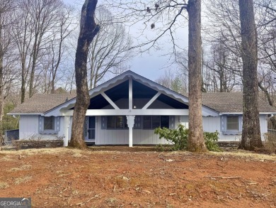 This beautifully renovated 4BR/4BA home, located in high on Sky Valley Resort and Country Club in Georgia - for sale on GolfHomes.com, golf home, golf lot