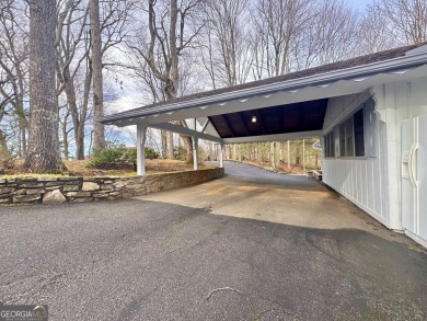 This beautifully renovated 4BR/4BA home, located in high on Sky Valley Resort and Country Club in Georgia - for sale on GolfHomes.com, golf home, golf lot