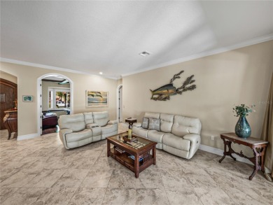 Discover your personal oasis in this stunning 4-bedroom on River Wilderness Golf and Country Club in Florida - for sale on GolfHomes.com, golf home, golf lot